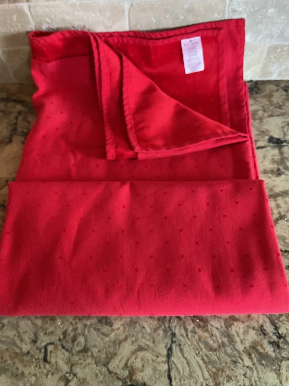 kate spade red tablecloth  with textured dots
